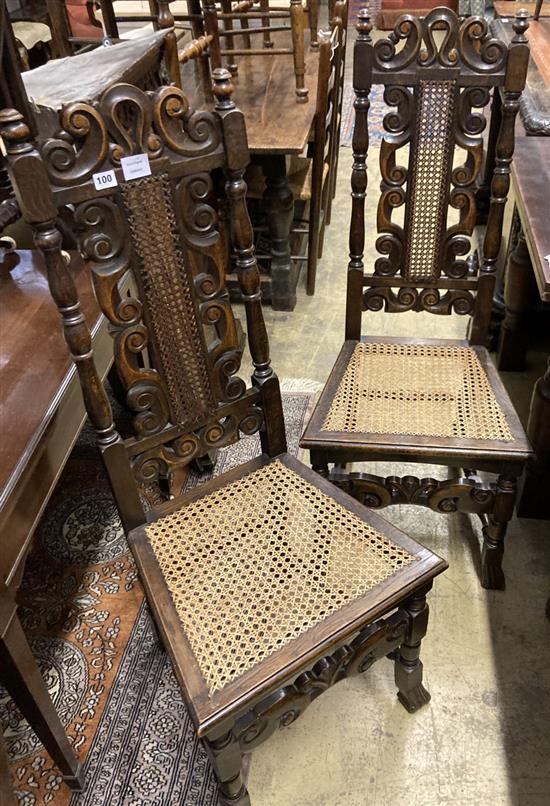 A set of four Carolean style dining chairs with caned seats and backs